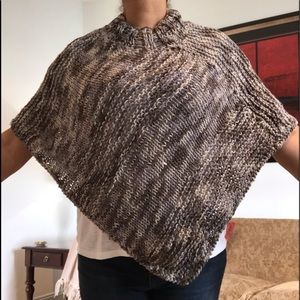 Poncho hand knitted. Gray mixed with white. Size S